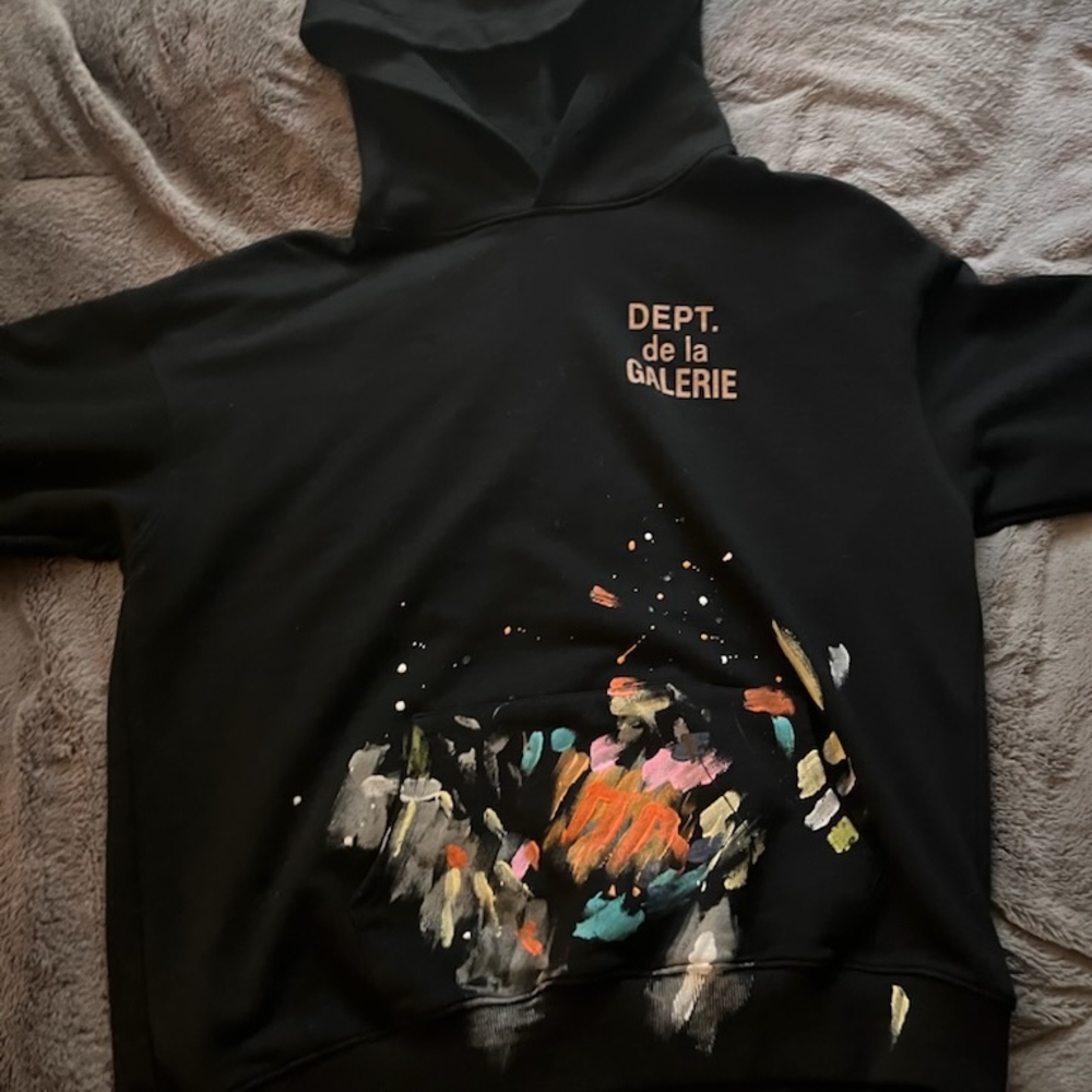 Black Hoodie with Artistic Paint Splatter